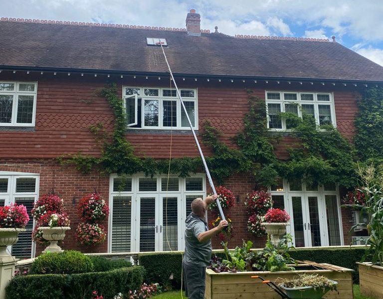 squeegee vs water fed pole window cleaning